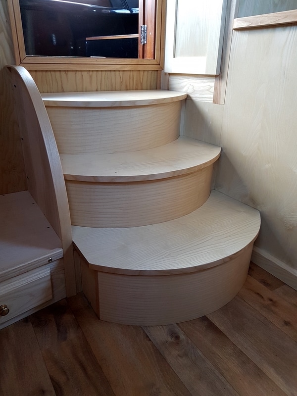 Curved Ash steps with storage